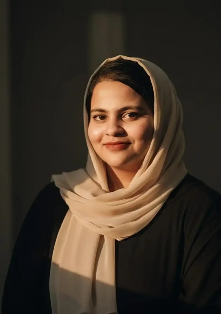 Professional portrait of a female web designer in Thrissur, Kerala smiling confidently